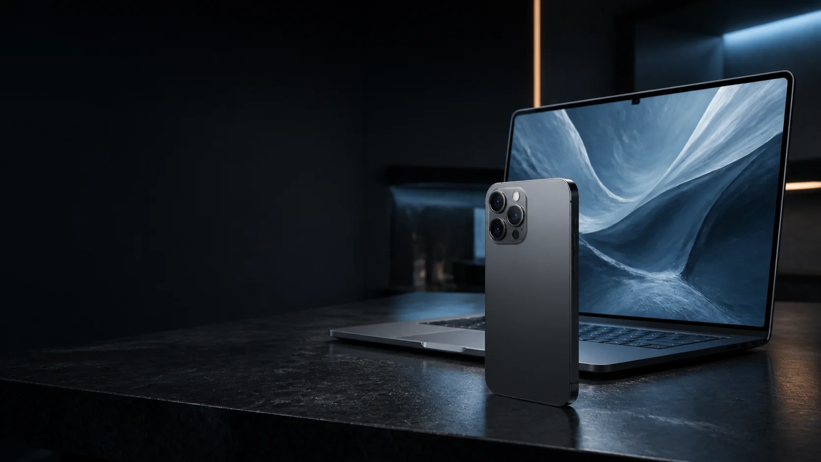 Celular y computador portátil en un atelier tecnológico oscuro